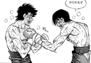 Alfredo bumping fists with Sendō to congratulate him