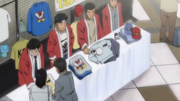 Umezawa selling Takamura merchandise