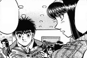 Kumi helping Ippo with a medical book about eye health