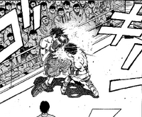 Ippo throws body blow