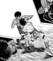 Antonio landing a left hook as their legs get tangled
