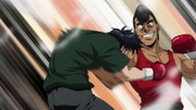 Takamura drilling a body blow on Miyata in spar