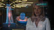 Pepper Potts monitoring Stark Tower's Arc reactor power levels