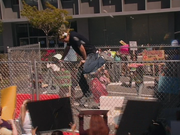 1x2 Dennis climbs fence.png