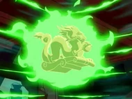 An enchanted statuette of a dragon being used to detect the power of combustion.