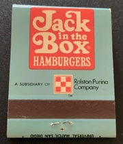 A Jack in the Box matchbook featuring the Ralston Purina logo.