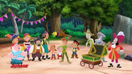 The treasure chest opens and Peter Pan reveals himself to Jake and his party guest.