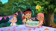 Jake about to blow the candles on his birthday cake.