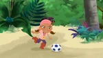 Izzy kicking a ball.