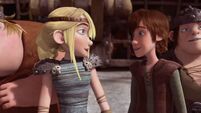 Hiccup and Astrid happy at the news given to them by Gobber