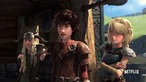 Astrid, Hiccup, and Tuffnut race to the edge