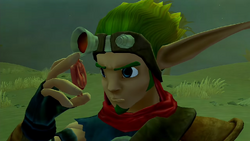 Jak observando el amuleto que Ashelin le había devuelto al negarse a volver a Villa Refugio a salvar la ciudad.