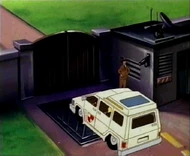 Internal main gate and security hut, as it appeared in the animated television series.