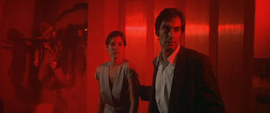 JBondPBouvierDeadHeller-RedLightEscape