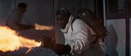 Che Che shoots a flamethrower at Piz Gloria.