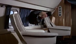 Goldfinger is sucked out of the depressurizing airplane.