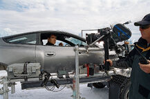 Brosnan filming on location in the Aston (Die Another Day)