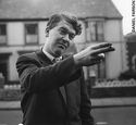 Sir Kingsley Amis, author Colonel Sun