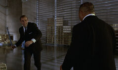 Oddjob battles with James in Fort Knox.