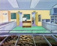 School cafeteria, as seen in Episode 19 ("Hostile Takeover") of the animated series.