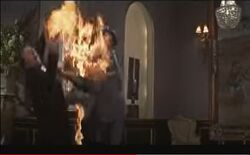Cooper despatches two enemies with flaming pikes at Casino Royale