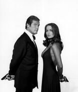 Barbara bach and roger moore promotional photo