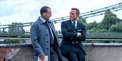 M Discussing Heracles with James Bond
