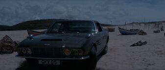 On Her Majesty's Secret Service - Bond pulls up on the beach in his DBS