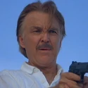 Milton Krest (Michael Lonsdale) (240 kio) Milton Krest Permis de tuer (1989)