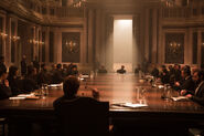 Oberhauser (Christoph Waltz) chairs a meeting in SPECTRE
