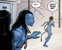 An upset Kiri shouts at Jake and Neytiri as she flees in anger.