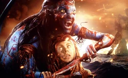 Neytiri is drenched in blood, about to slash Spider with her knife.