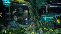  and Colonel  observe a hologram of the Omatikaya clan's Hometree.