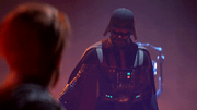 Cal sieht Darth Vader direkt an, welcher wiederum bedrohlich wirkend vor dem metallischen Folterstuhl steht.