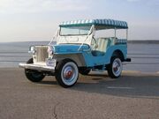 1964 Willys Jeep DJ-3A Surrey Gala in Blue.jpg