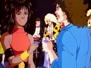 Lena and Ron Cox make a cameo at The Stingers' party in Riot's Hope.