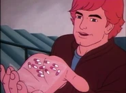 Bobby holding a plastic bag containing drugs.