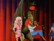 Corvin saving Adriana from the bomb on stage.