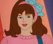 Laura smiling and looking more youthful after she recovers from her addiction.