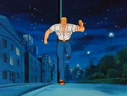 Being discovered by Jem and The Holograms, Mickey escapes into the night.