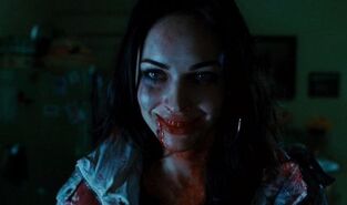 Jennifer after killing Ahmet, drenched in blood.