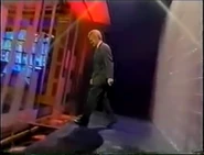 Angle of Alex Trebek about to enter through the sliding doors on the first show of this set (Celebrity Jeopardy! - November 11, 1996)