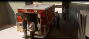 Gunman with ambulance.png