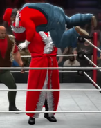 Mario Byeah getting picked up "like a baby" and dropped out the ring by Santa Claus