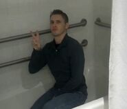 Jerma doing a peace sign and a dumb face in the tub