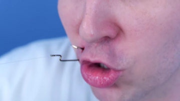 Fish hook lip piercing top