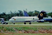 Flight West Fokker F28-4000 in cowboys livery at Cairns