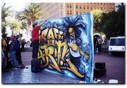 A "Graffiti is Art!" sign.