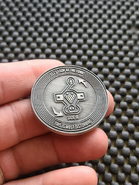 Numskull coin 'side a'.