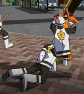 Two police officers holding onto the player.